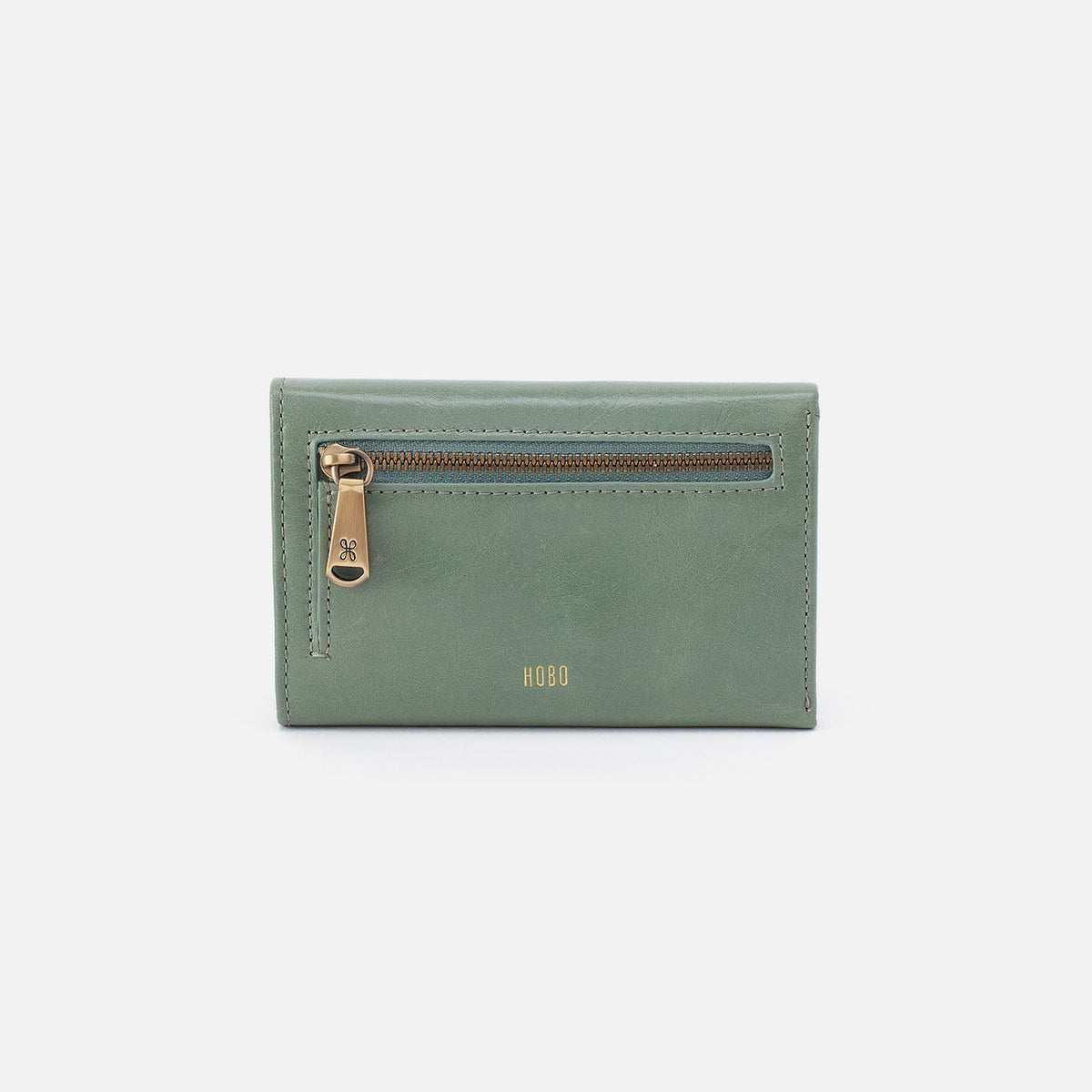 Jill Trifold Wallet In Polished Leather - Jade | HOBO Classic