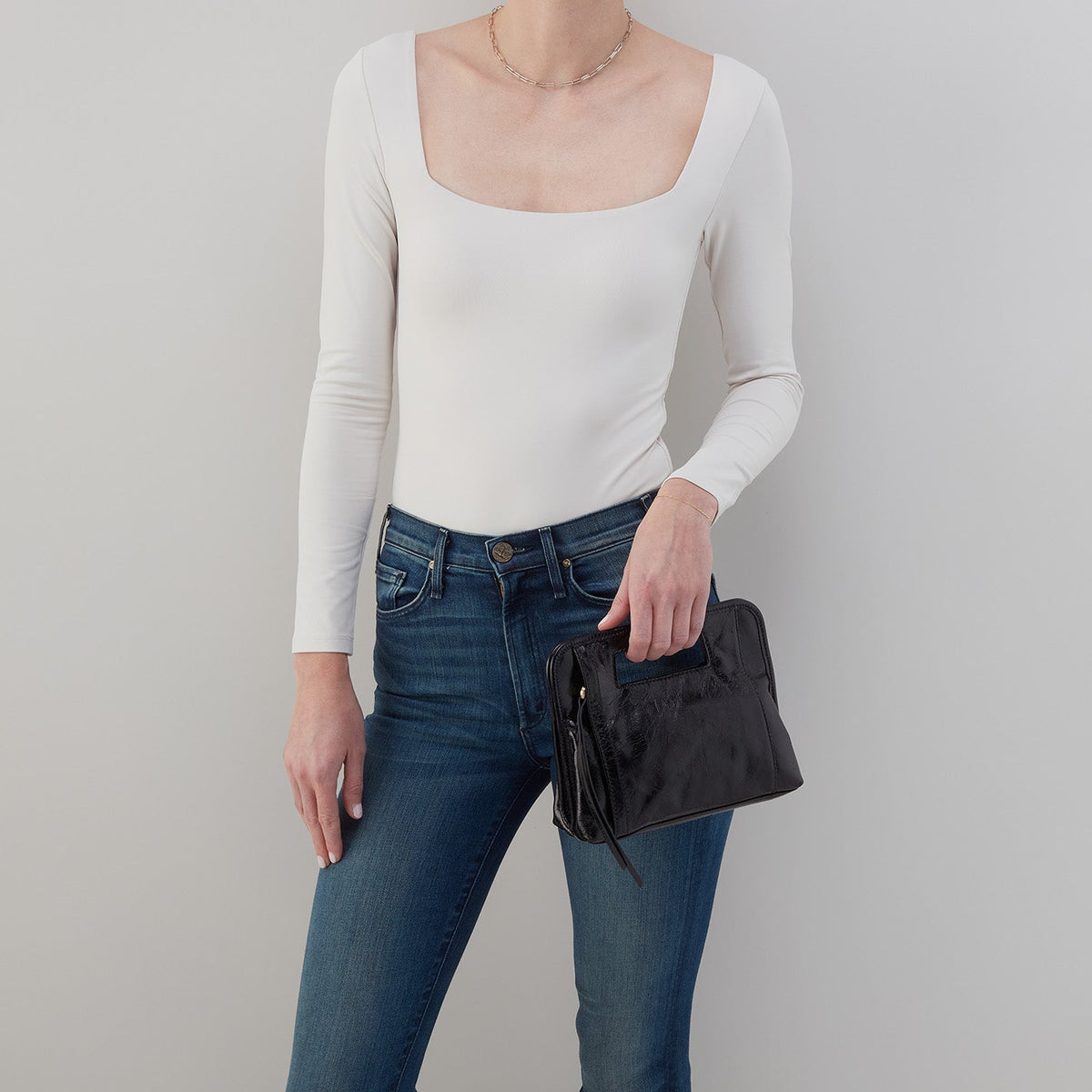 Ace Clutch In Polished Leather - Black | HOBO Great Value