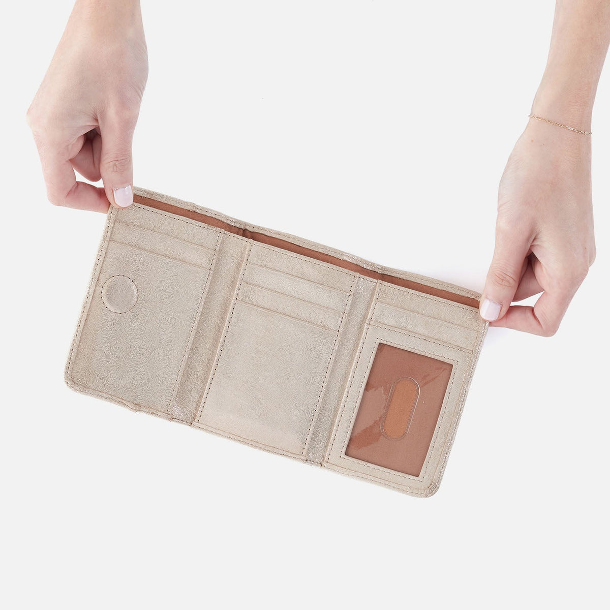 Jill Trifold Wallet In Metallic Leather - Sand Shimmer | HOBO Deals