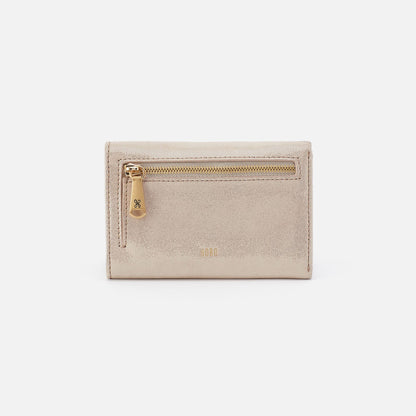 Jill Trifold Wallet In Metallic Leather - Sand Shimmer | HOBO Deals
