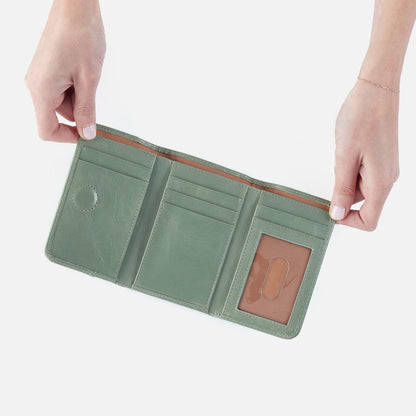 Jill Trifold Wallet In Polished Leather - Jade | HOBO Classic