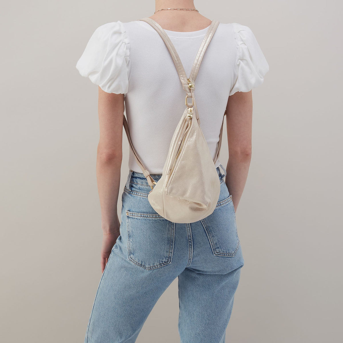 Sway Small Sling In Metallic Leather - Sand Shimmer | HOBO Latest