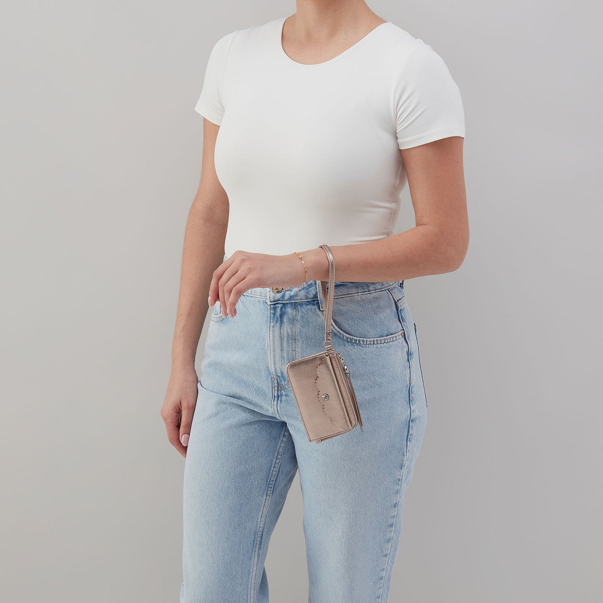 Tabby Card Wristlet In Metallic Leather - Cameo Quartz | HOBO Trusted